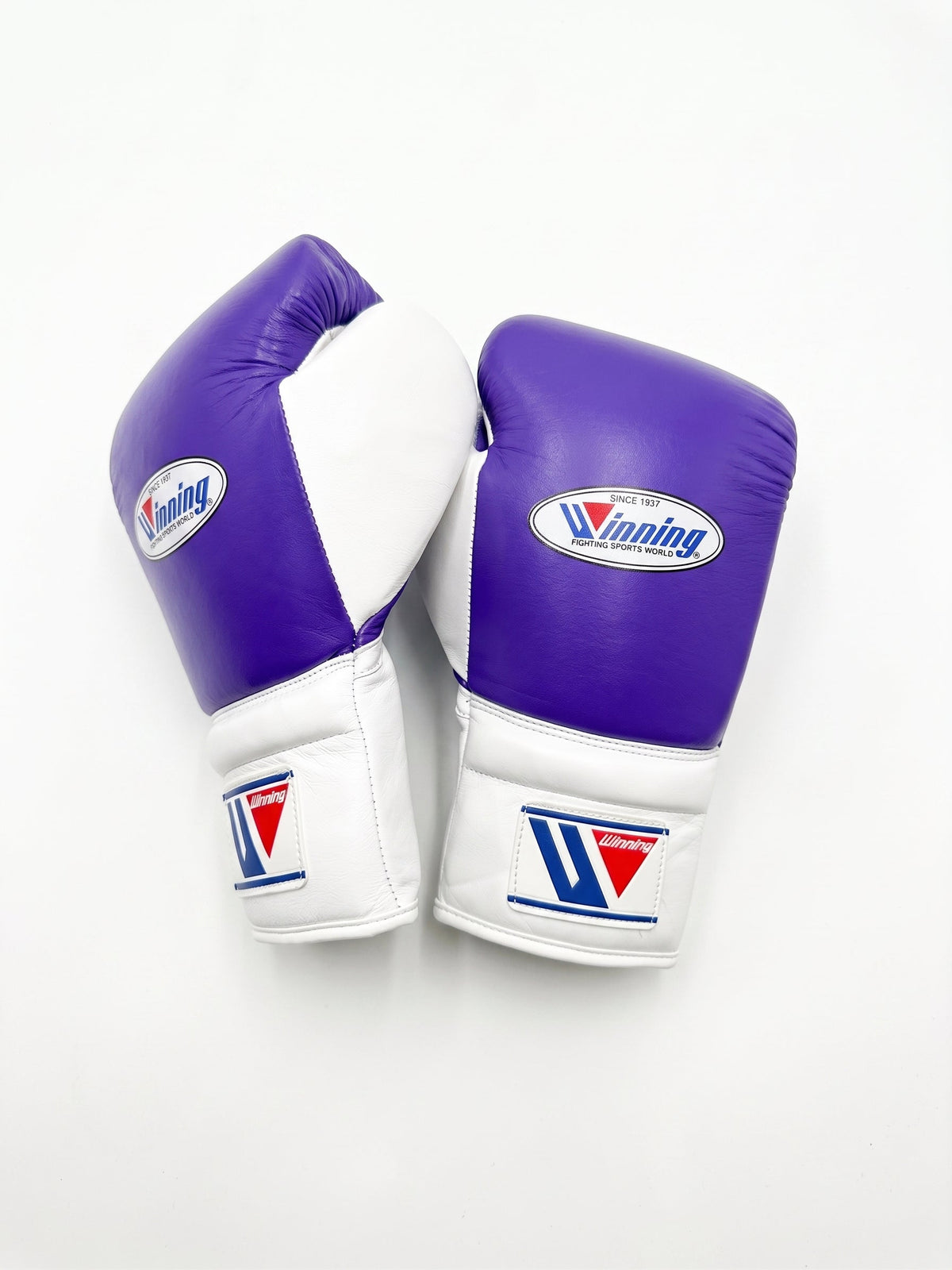 Winning lace-up boxing glove with lavender purple back, white palm and white cuff in a soft pastel finish - side view