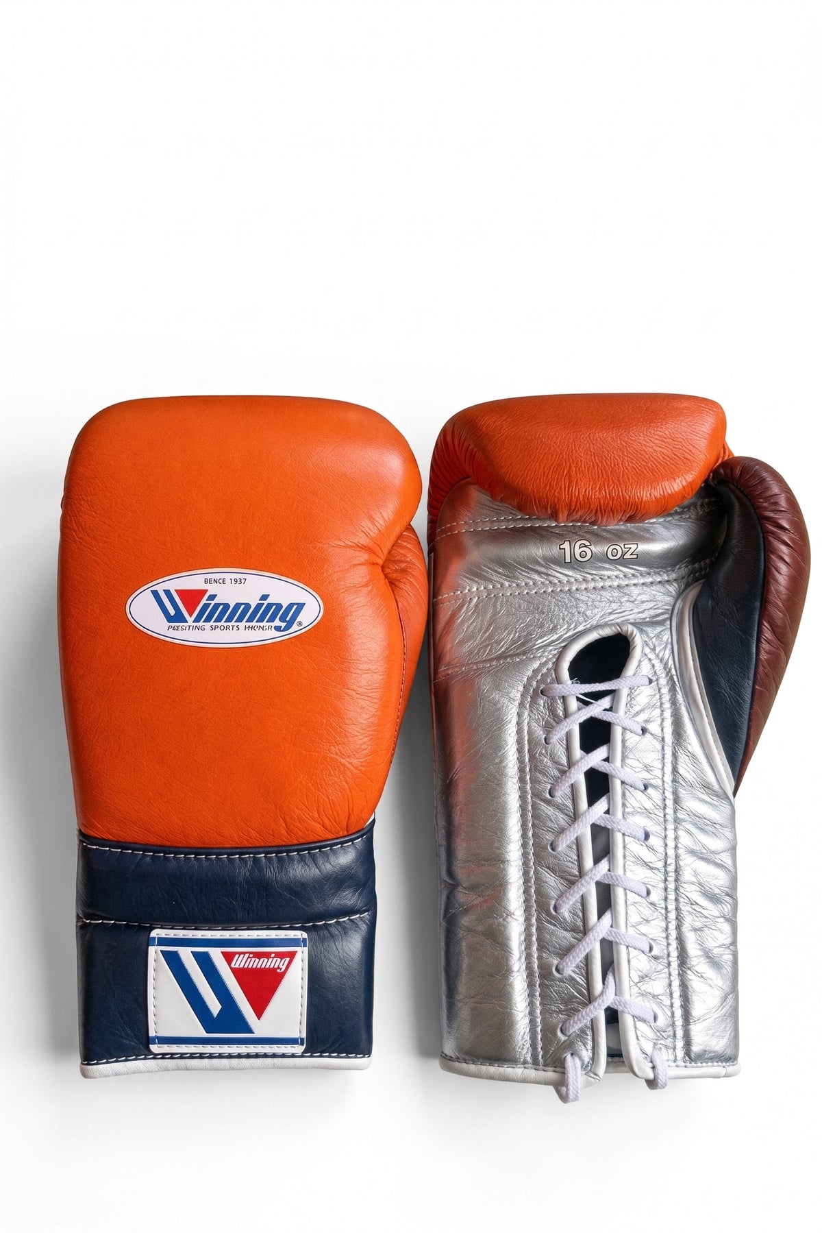 Winning orange boxing gloves with a silver palm and navy cuff, laced at the wrist