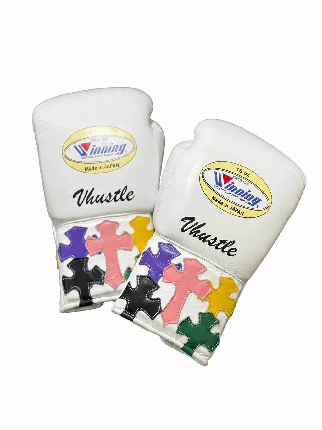 Winning white boxing gloves with multicolor cross patches on the cuff and a sample script name print - side view
