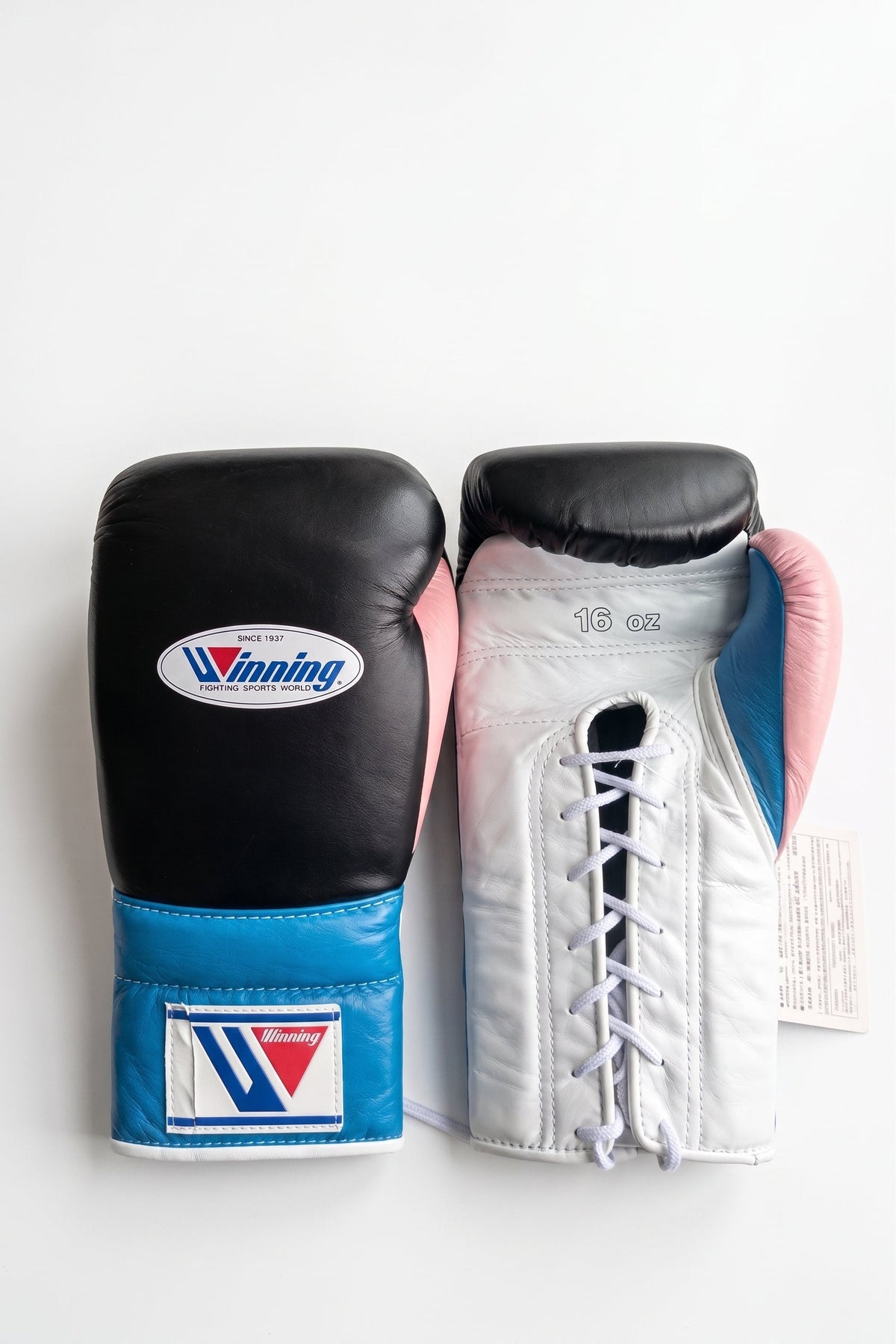 Winning black boxing gloves with white palm, sky blue cuff and pink inner thumb, lace-up closure