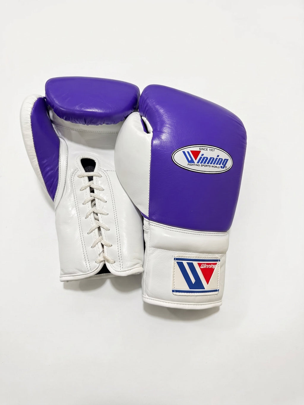 Winning lace-up boxing glove with lavender purple back, white palm and white cuff in a soft pastel finish - alternate angle