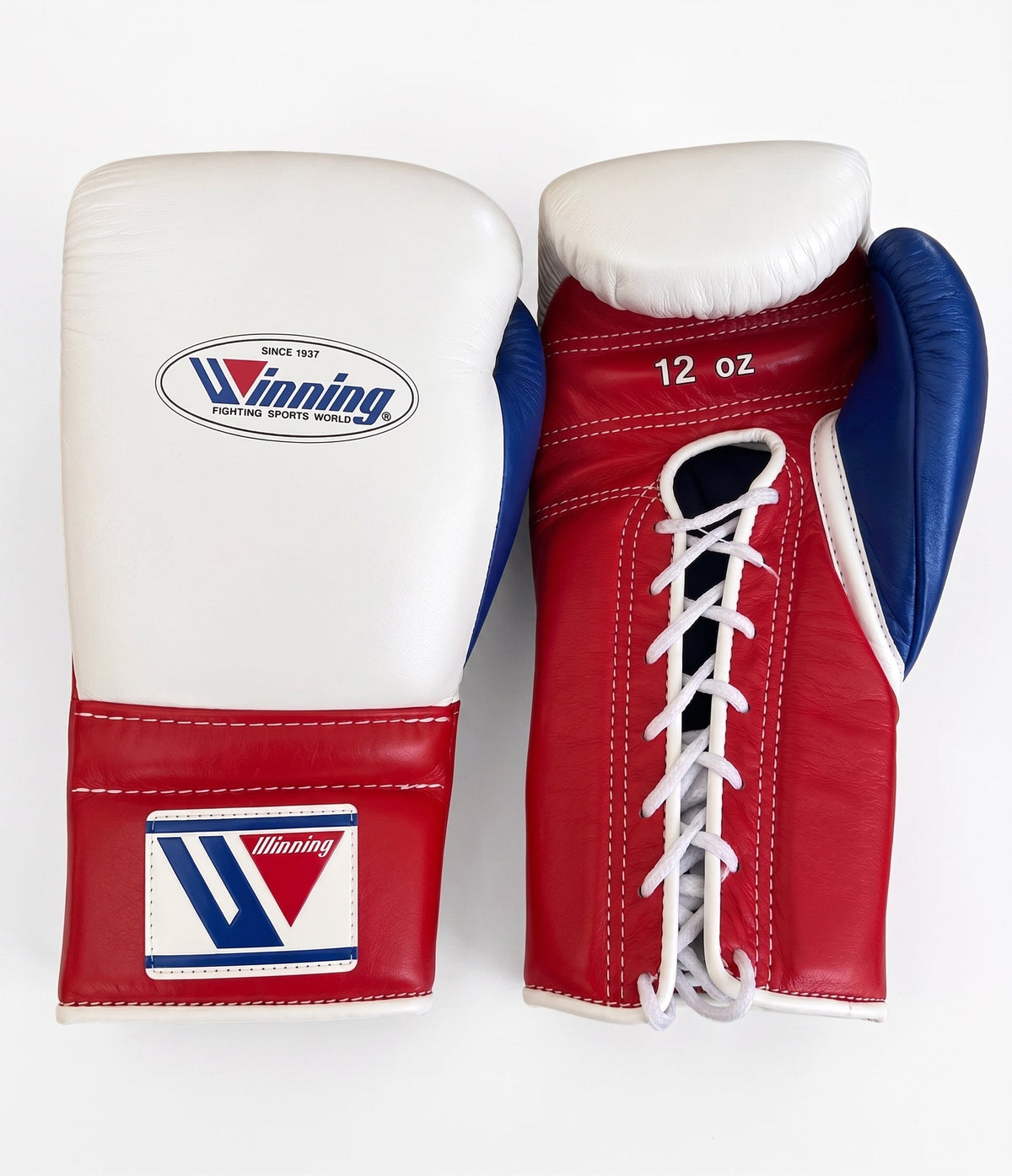Winning lace-up boxing glove with white back, red palm and cuff, and a blue inner thumb matching the logo