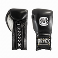 Pair of Cleto Reyes black lace-up boxing gloves with white laces and white palm lining, front and side