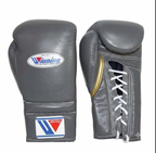 Winning all-gray lace-up boxing gloves with a gold inner thumb and W logo on the cuff