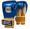 Cleto Reyes metallic blue boxing gloves with metallic gold cuff and strap, white piping and oval logo