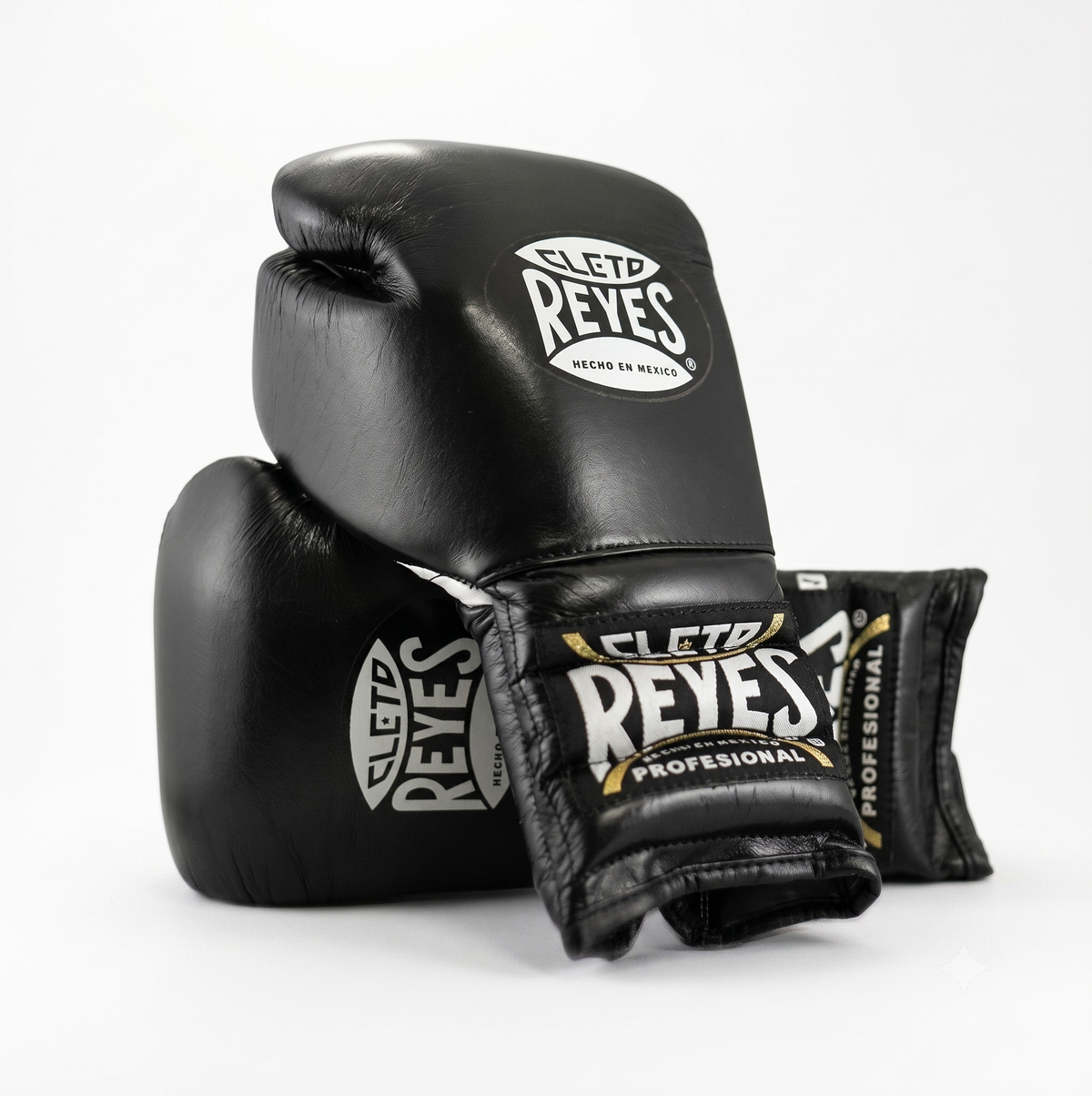 Cleto Reyes black leather boxing gloves side by side showing brand logo patches