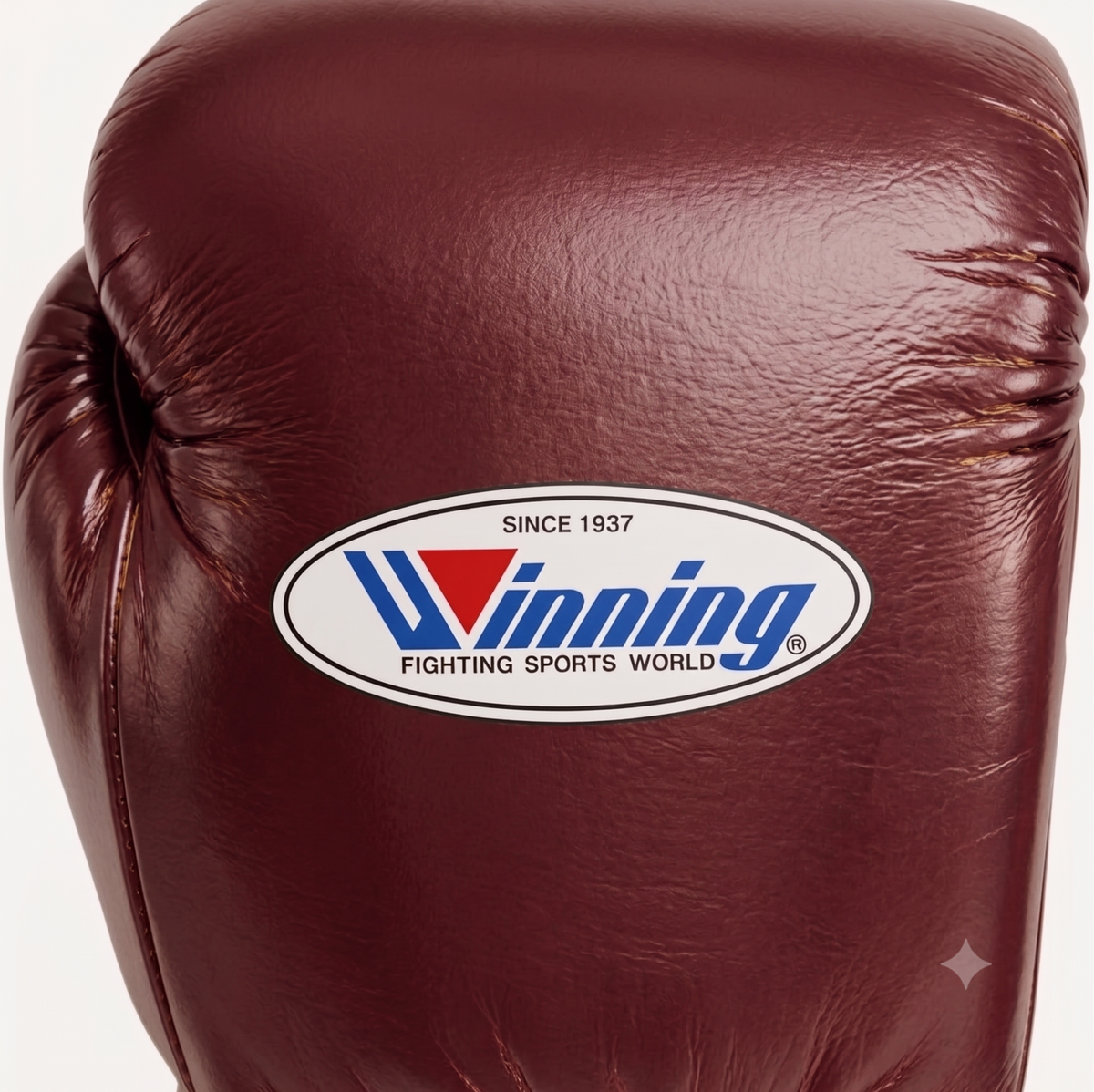 Winning MS-300 solid burgundy boxing gloves with white laces and red, white and blue W logo - palm and closure detail