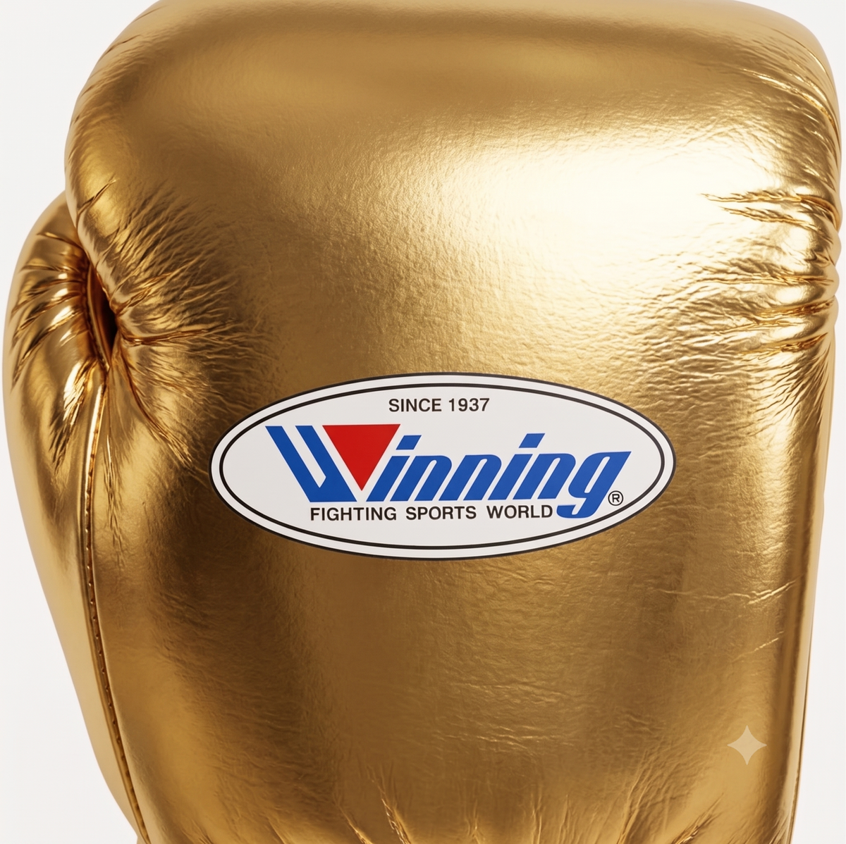 Winning MS-600 lace-up boxing glove in full metallic gold leather reflecting light across the back - palm and closure detail