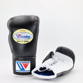 Winning MS-300 boxing gloves with black back, white palm and black cuff, laced at the wrist