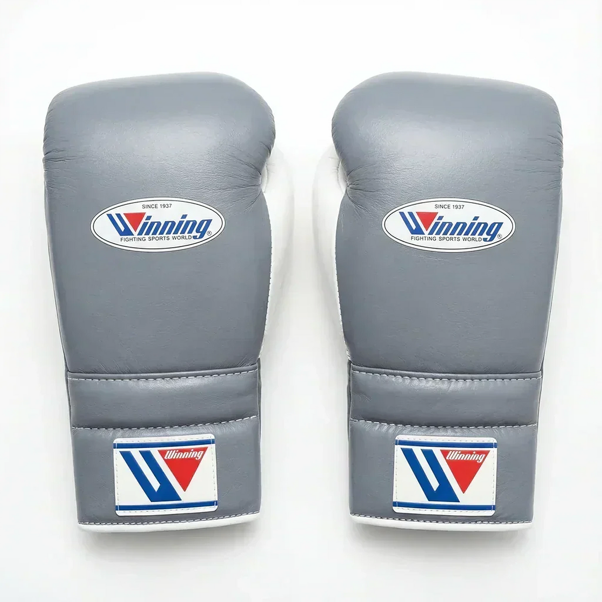 Winning MS-500 boxing gloves with light gray back and black palm, lace-up wrist and W logo - side view