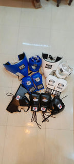 Detail view of the royal blue Cleto Reyes boxing set pieces with oval logo