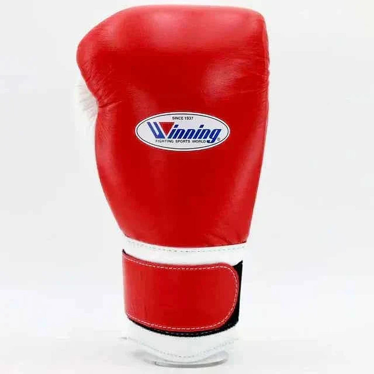 Winning MS-600-B Velcro boxing glove in red leather with a white hook-and-loop strap across the cuff - side view