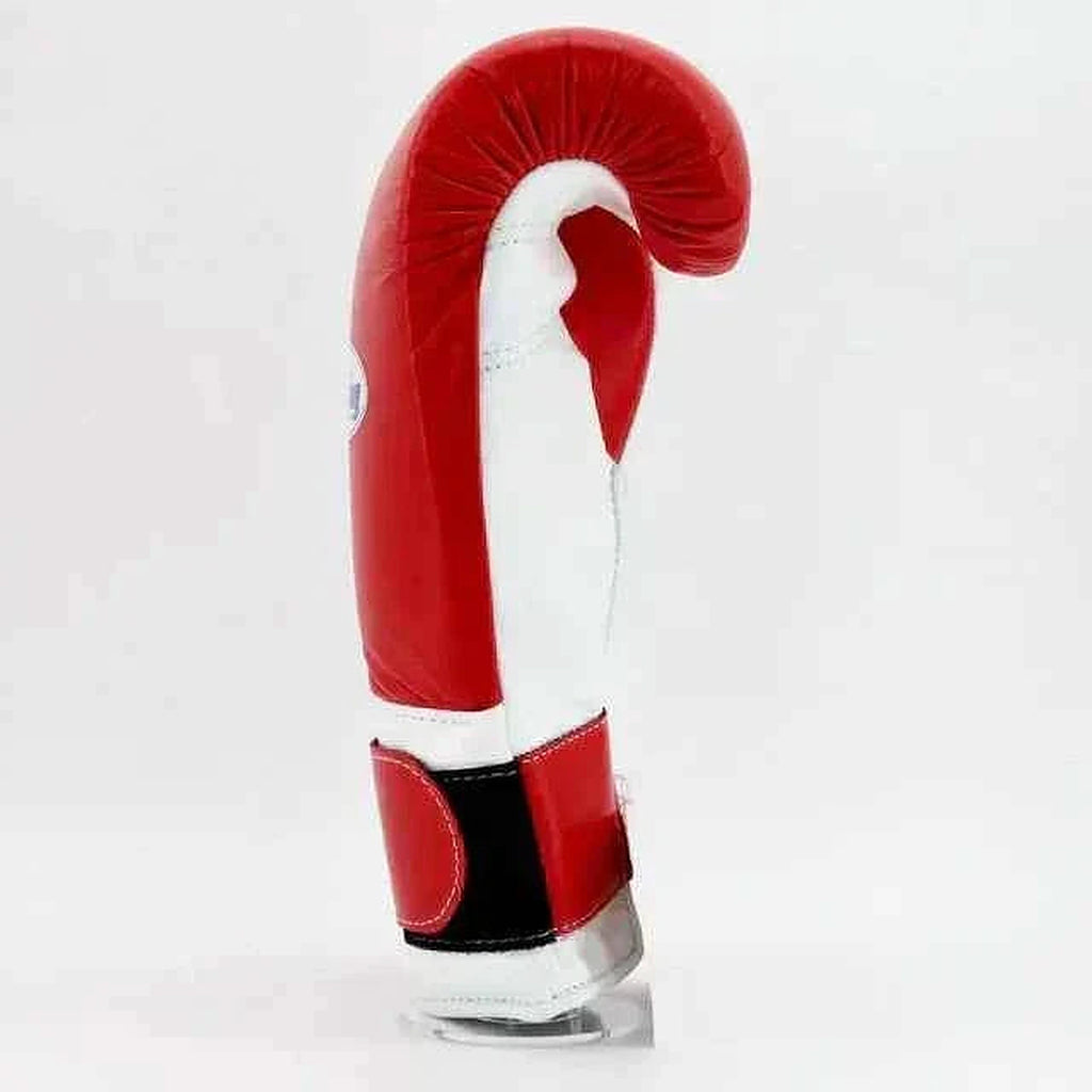 Winning MS-600-B Velcro boxing glove in red leather with a white hook-and-loop strap on the cuff - palm and closure detail