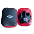 Winning focus mitts with flat black striking face, bold red rim around the edge and red hand grip