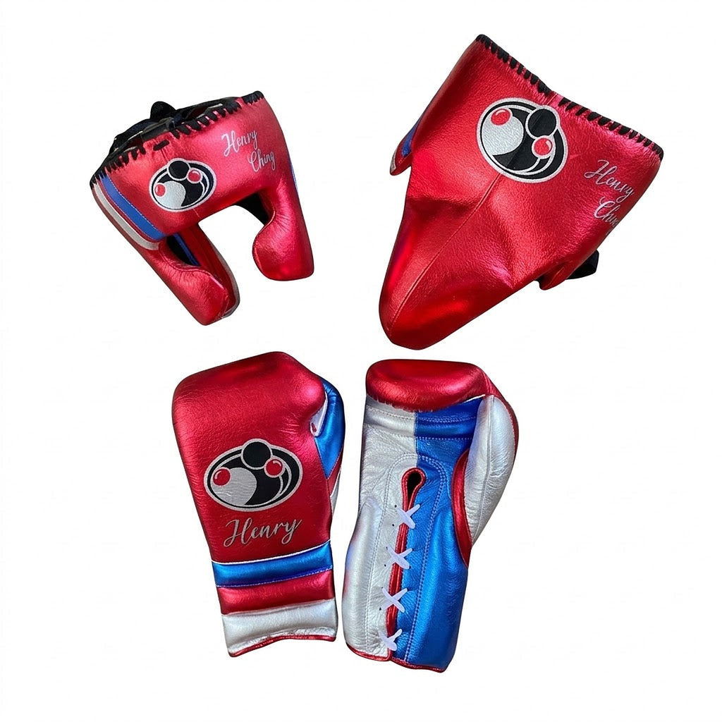 Grant metallic red lace-up gloves, headgear and groin guard with white and blue stripes across each piece