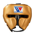 Winning cheek protector headgear in a warm metallic bronze-gold finish with an open face front