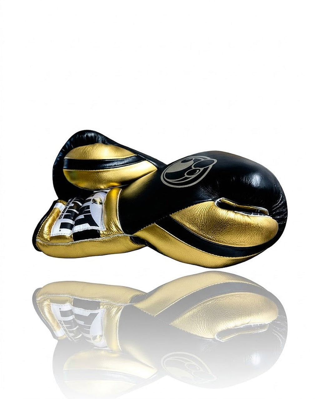 Grant black and metallic gold two-tone boxing gloves with black laces on gold palm and gold cuff logo patch - alternate angle
