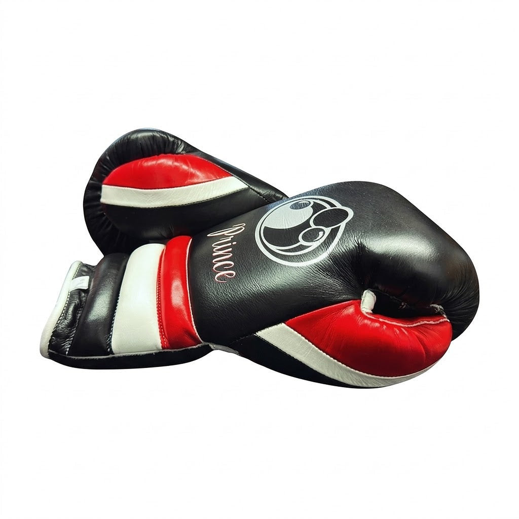Black Grant boxing gloves with red inner thumb, red and white cuff stripes and sample Prince name print - side view