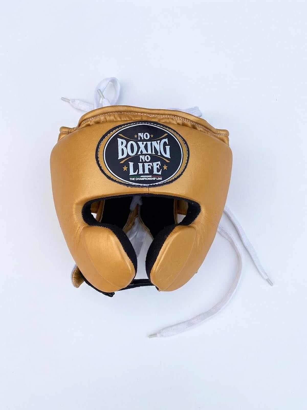 No Boxing No Life caramel tan boxing set: lace-up gloves, headgear and groin guard in one color - close-up of logo and cuff