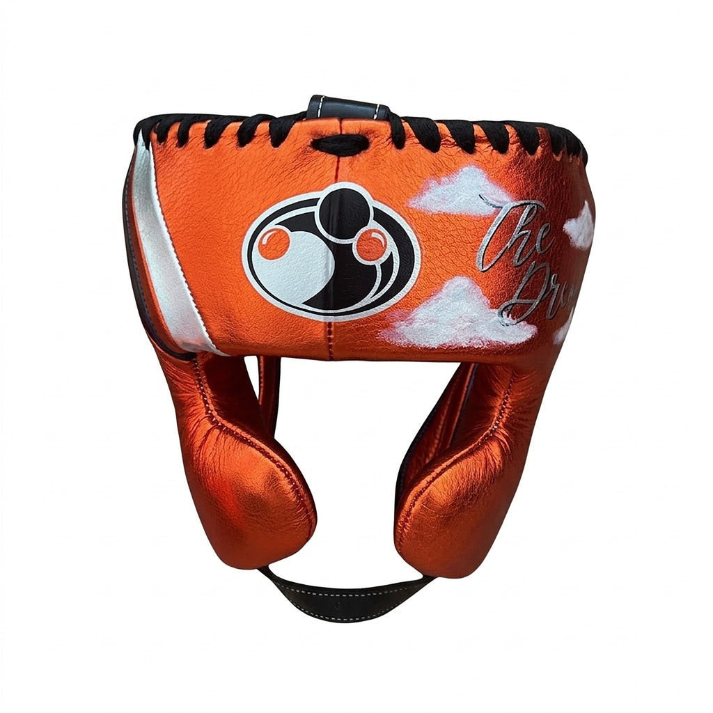 Grant metallic orange lace-up gloves with silver GRANT cuff patch, orange headgear and groin guard - palm and closure detail