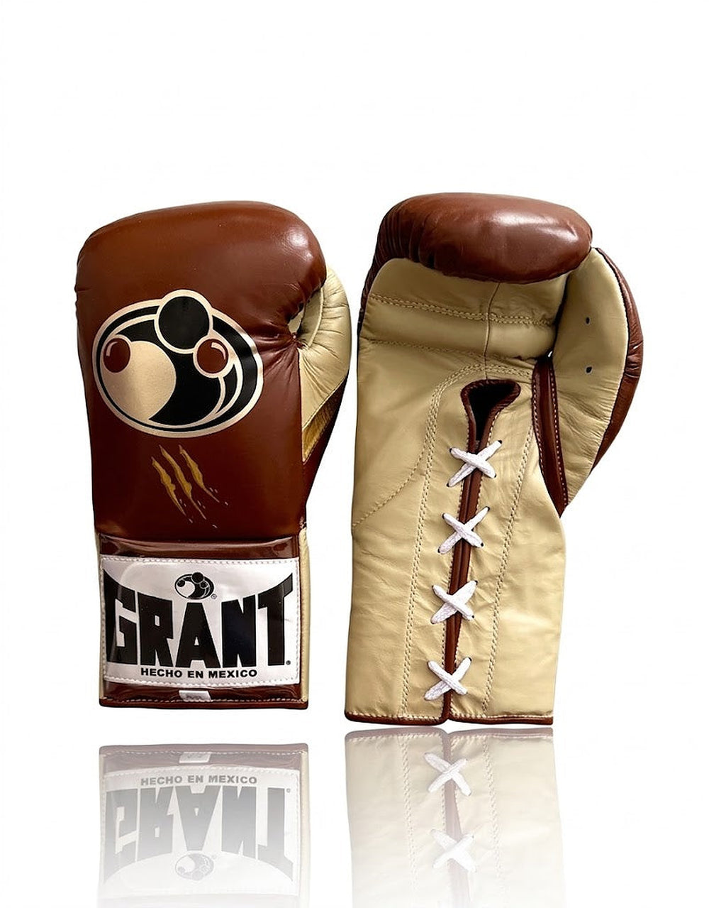 Grant chocolate brown boxing gloves with cream palm and white laces giving a vintage lace-up look