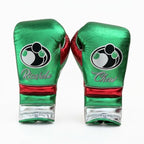 Grant metallic green lace-up boxing gloves and headgear with a red and white cuff band at the wrist - side view