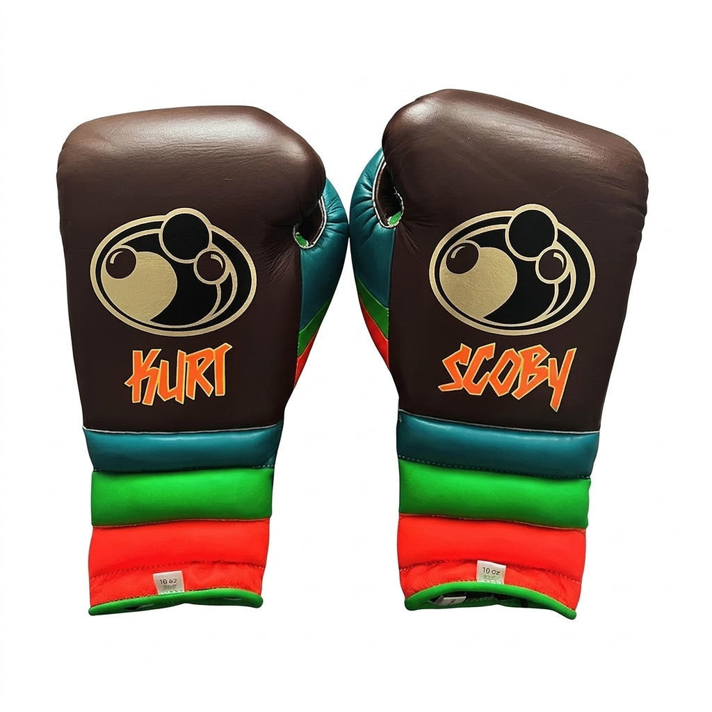 Grant brown lace-up boxing gloves, headgear and groin guard with orange, green and red striped cuffs - side view