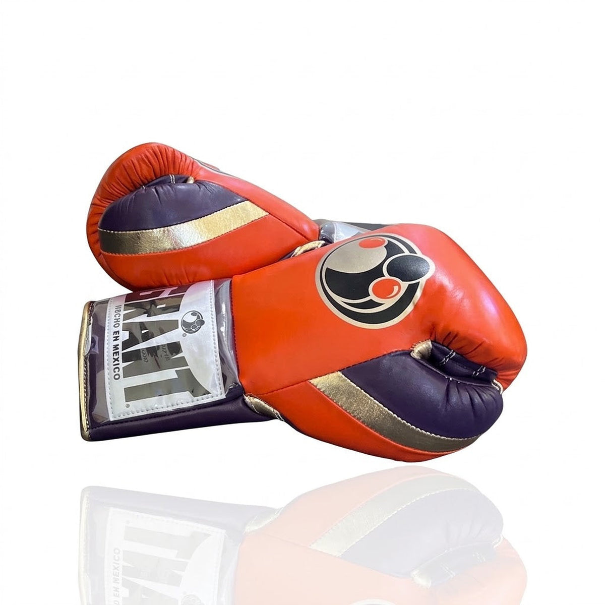 Grant lace-up boxing gloves with bright orange back, deep purple palm and white laces down the center - side view