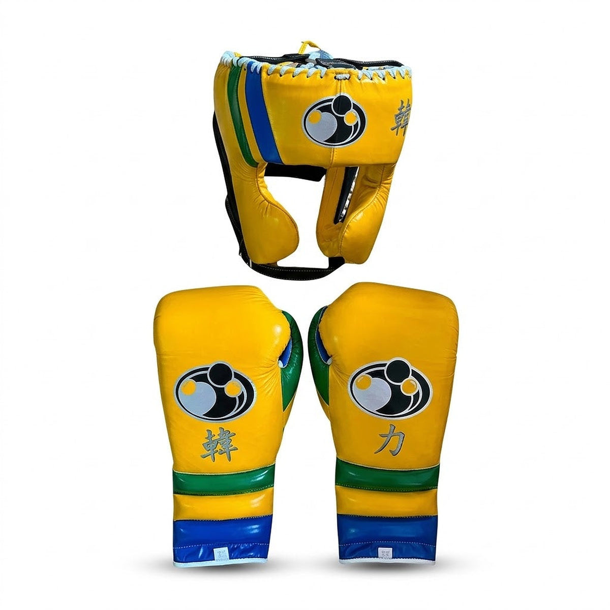 Grant yellow lace-up boxing gloves and matching yellow headgear with green and blue stripes on the cuffs