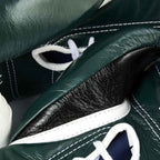 Winning MS-600 solid dark green boxing gloves with white laces - palm and closure detail