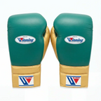 Winning emerald green boxing gloves with metallic gold cuff, gold thumb and lace-up closure