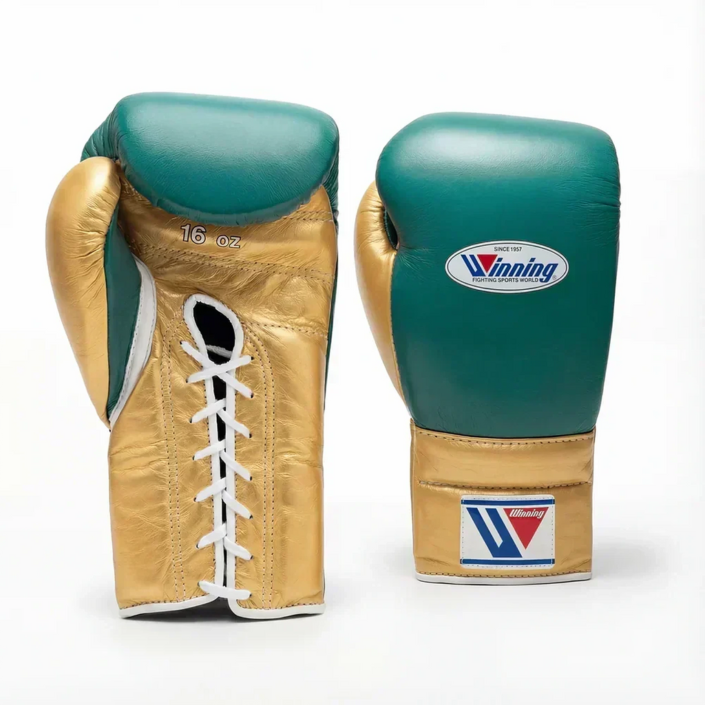 Winning emerald green boxing gloves with metallic gold cuff, gold thumb and lace-up closure - side view