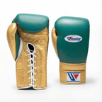 Winning emerald green boxing gloves with metallic gold cuff, gold thumb and lace-up closure - side view