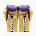 Winning lace-up boxing glove in purple leather with a gold cuff at the wrist - palm and closure detail