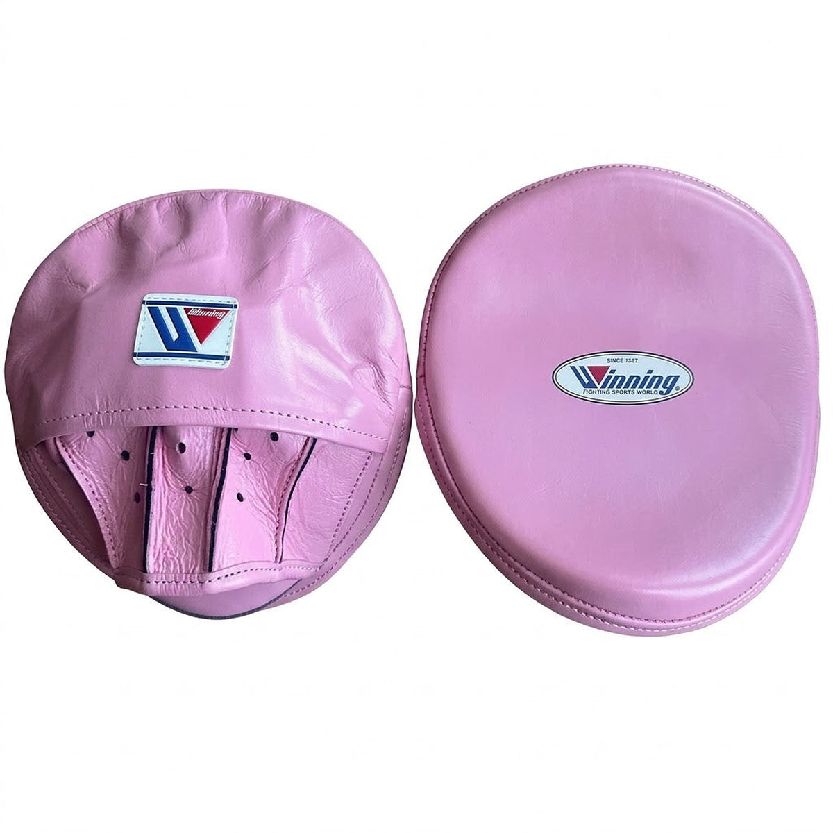 Winning light pastel pink curved focus mitts in one soft pink tone throughout, pair shown side by side
