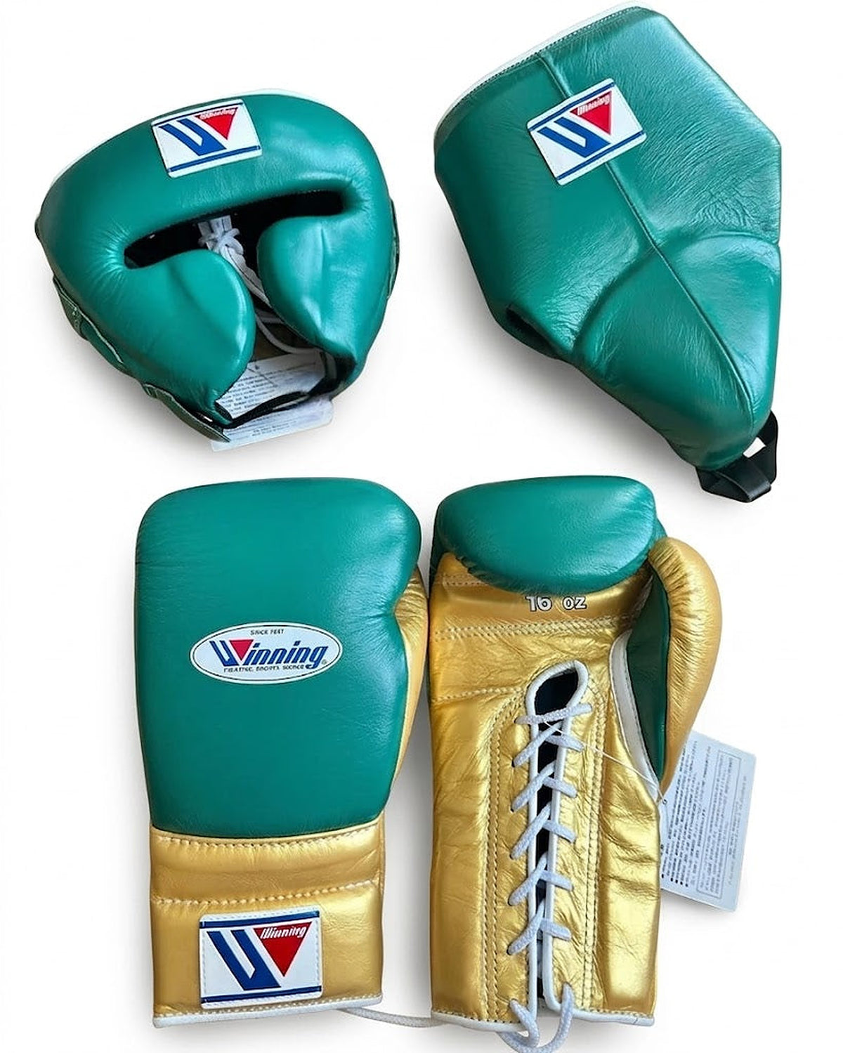 Winning teal green boxing set with gold palm lace-up gloves, teal headgear and groin guard