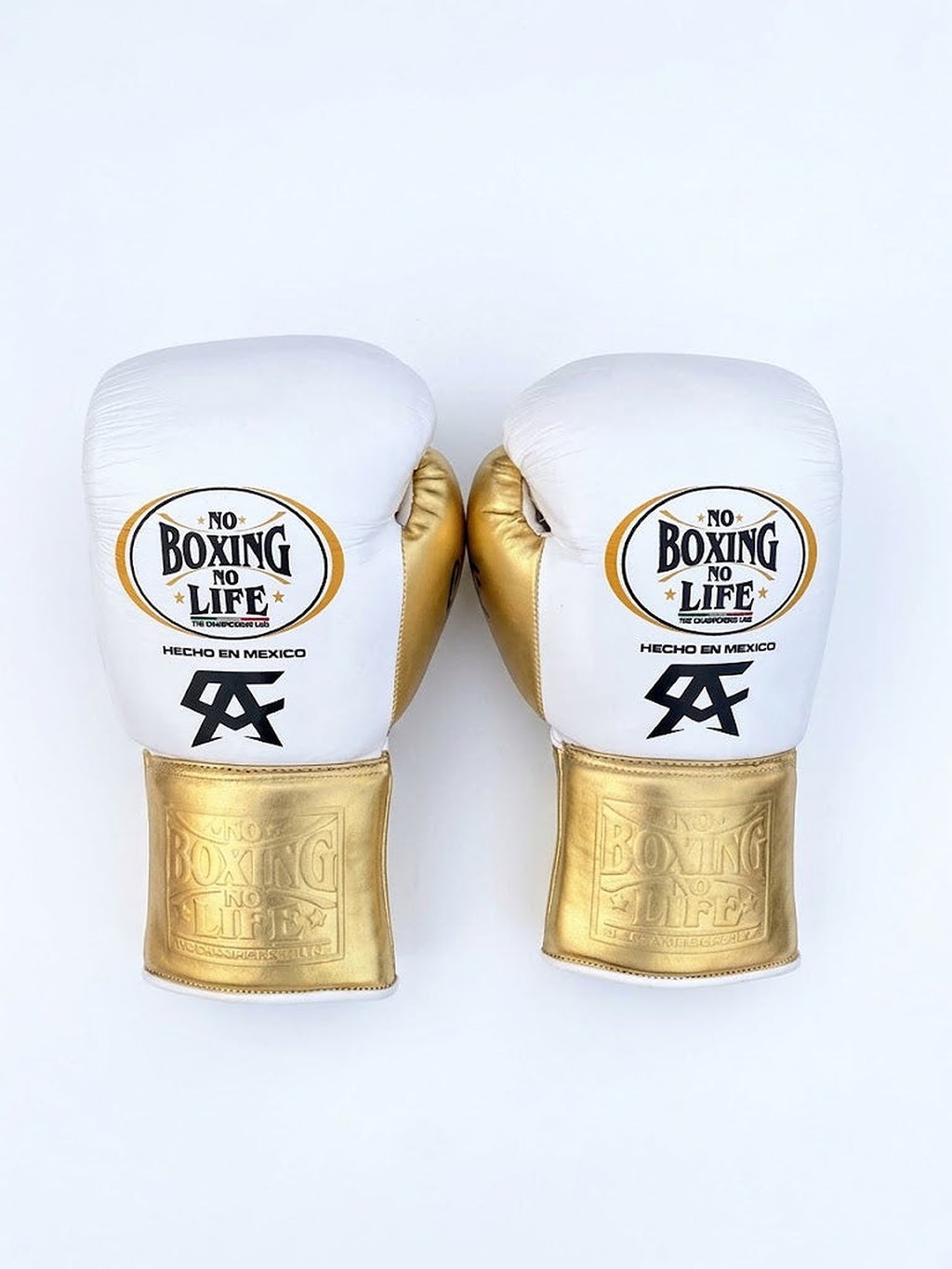 No Boxing No Life white Velcro boxing gloves with metallic gold strap cuff and black monogram - palm and closure detail