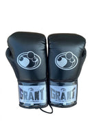 Grant full black lace-up boxing gloves with black laces and white logo on the cuff patch - side view